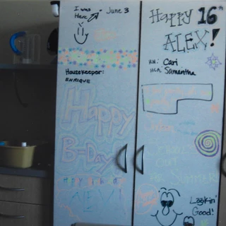 Alex's hospital board with birthday wishes from the staff