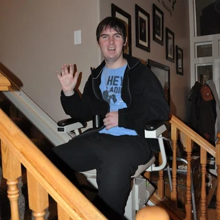 Alex using his chair lift