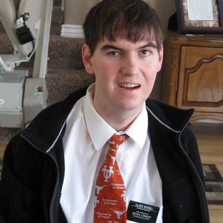 Alex wearing his missionary name tag