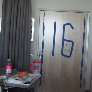 16 on Alex's hospital room door