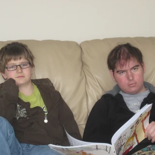 Alex and Josh reading Calvin and Hobbes
