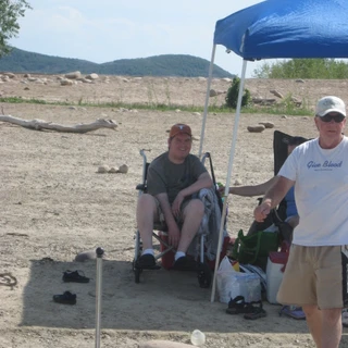 Alex in his wheelchair at the lake