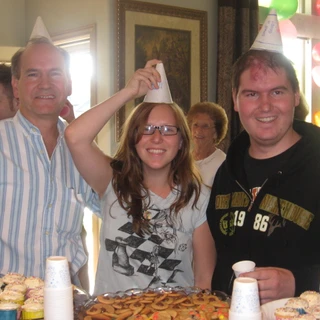 Alex, Dad, and Madison and his tumor shrinking party