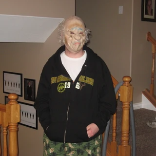 Alex wearing a halloween mask