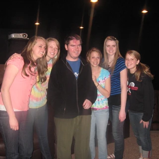Alex with the young women