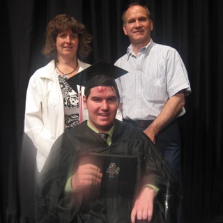 Alex, Mom, and Dad at his graduation