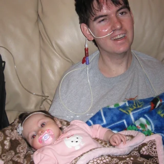 Alex holding Brooklyn