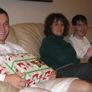 Alex, Chris, and mom on Christmas