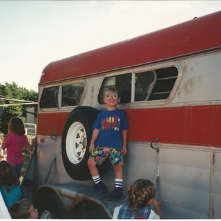 Alex standing on a trailer
