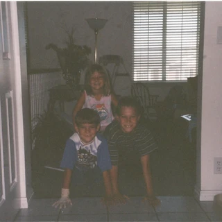 Alex, Chris, and Nicole in a pyramid