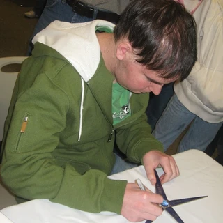 Alex signing his Make A Wish star (2)