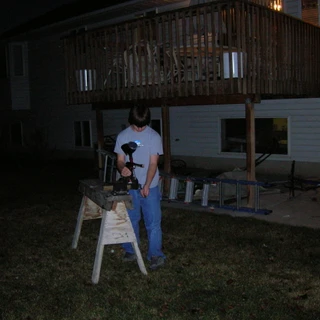 Alex doing science project with a paintball gun