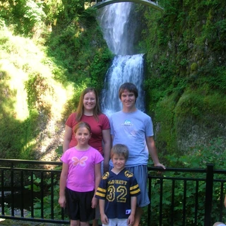 Anna, Alex, Nicole, and Josh by a waterfall