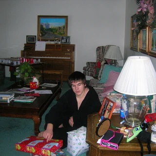 Alex opening gifts