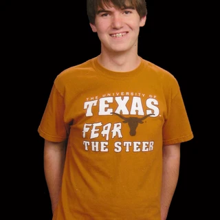Alex portrait in a Texas shirt