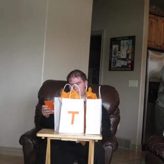 Alex opening up his gift