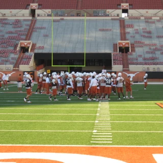 Texas football team practicing on the field