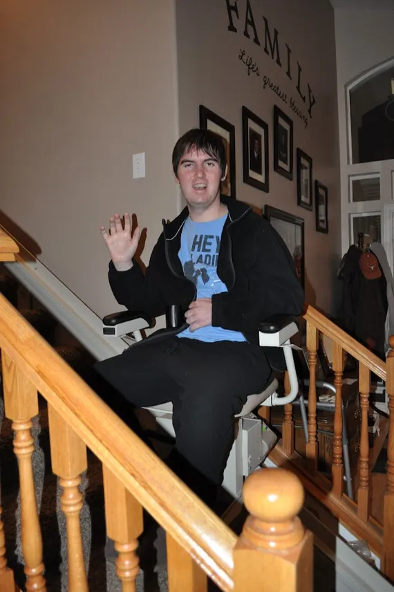 Alex using his chair lift