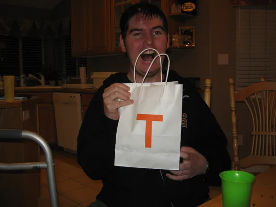 Alex holding his birthday present