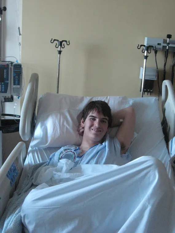 Alex in his hospital bed