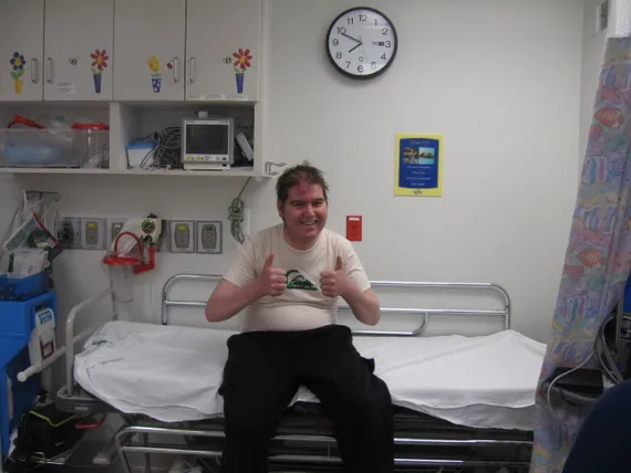 Alex smiling at the hospital