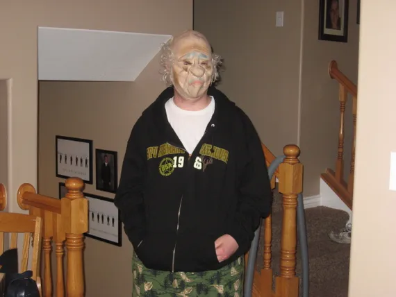 Alex wearing a halloween mask