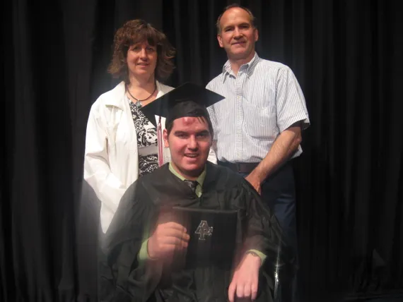 Alex, Mom, and Dad at his graduation