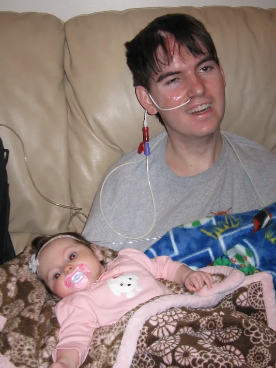 Alex holding Brooklyn