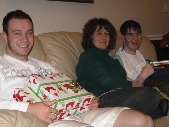 Alex, Chris, and mom on Christmas