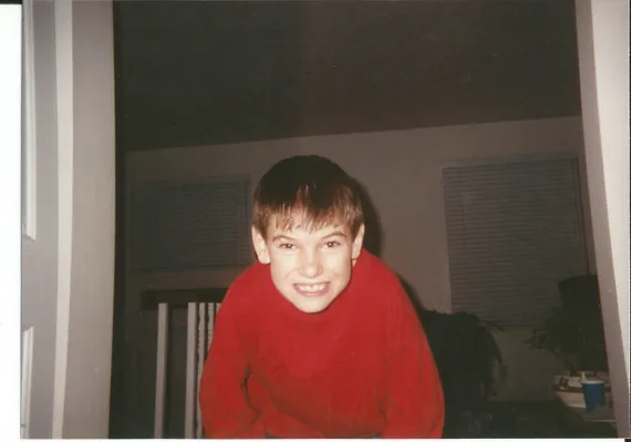 Alex wearing a red shirt