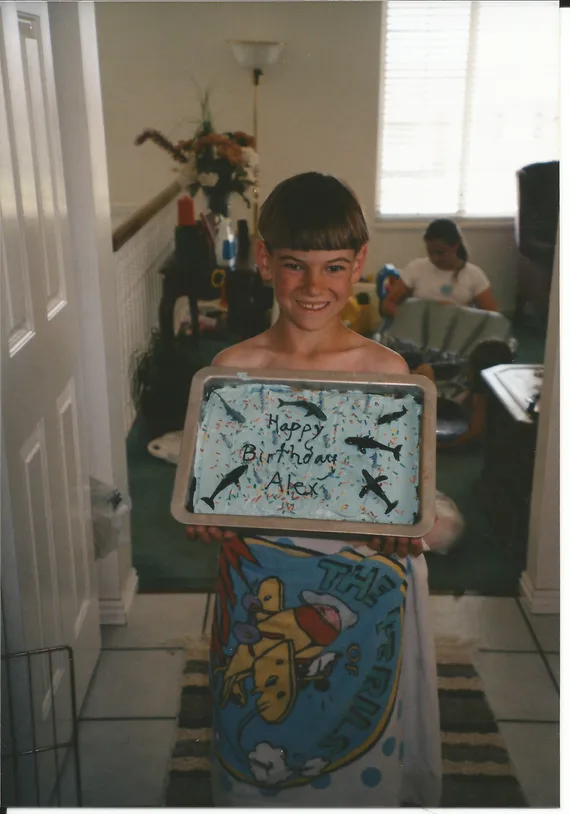 Alex holding an ocean birthday cake