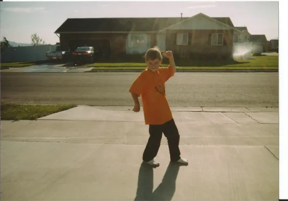 Alex flexing in the driveway