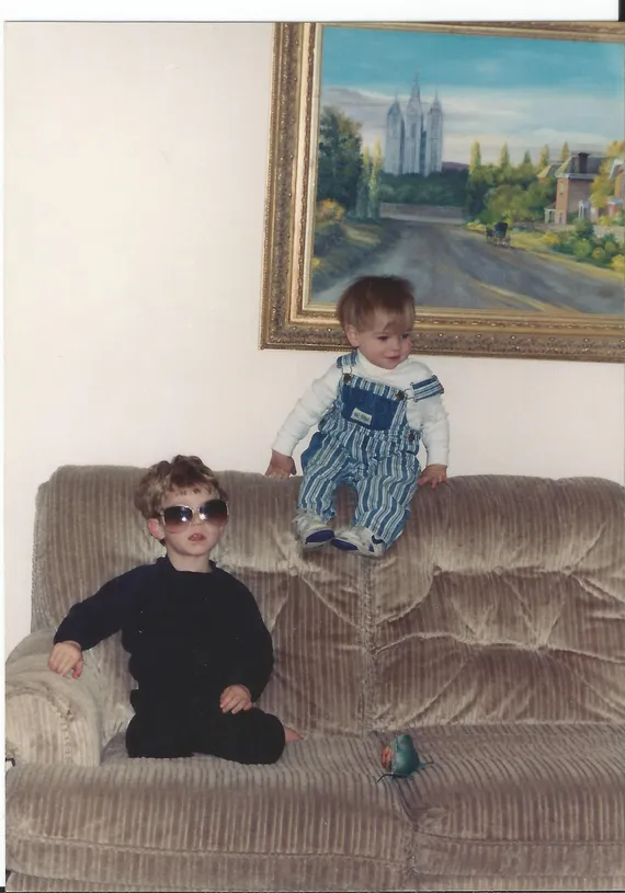 Alex and Chris sitting on the couch