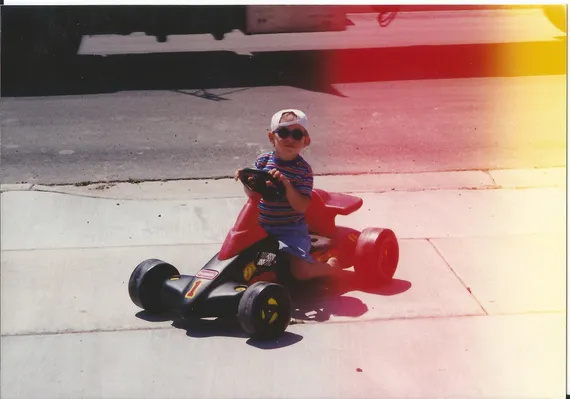 Alex driving a racecar