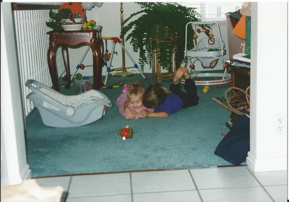 Alex and Nicole playing on the floor