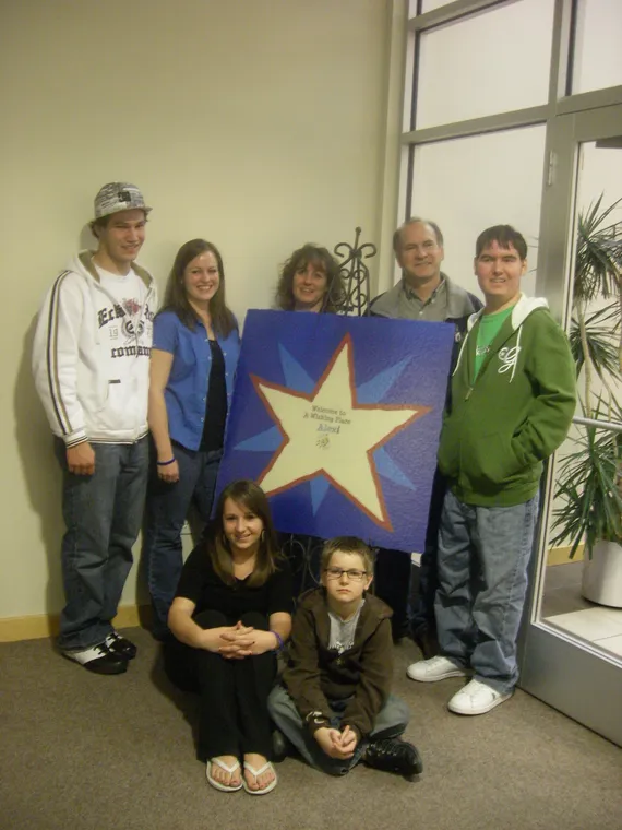 Family photo at Make A Wish Welcome sign (2)