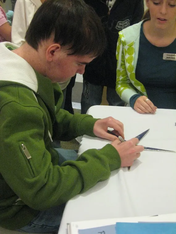 Alex signing his Make A Wish star