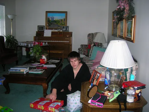 Alex opening gifts