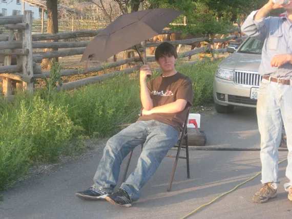 Alex sitting in a chair at his eagle project