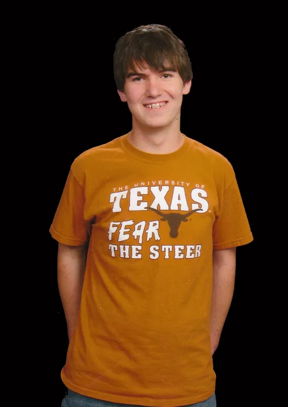 Alex portrait in a Texas shirt