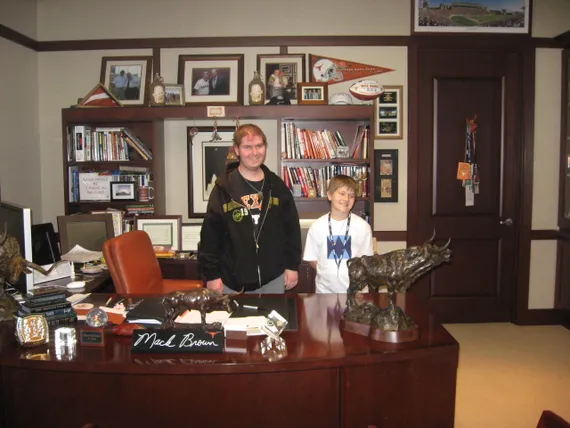 Alex and Josh at Mack Brown's desk