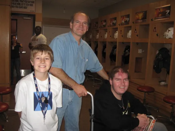 Alex, Dad, and Josh in the locker room