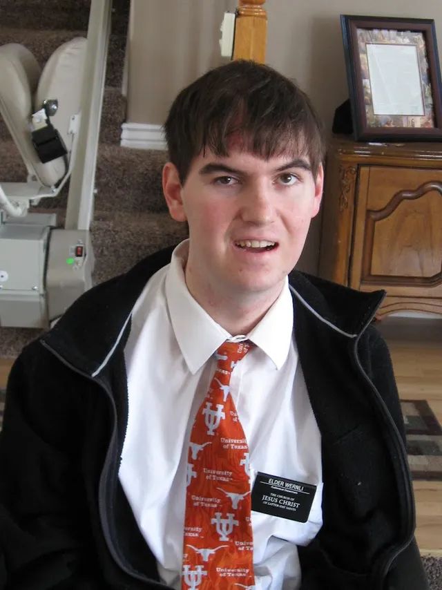 Alex wearing his missionary name tag